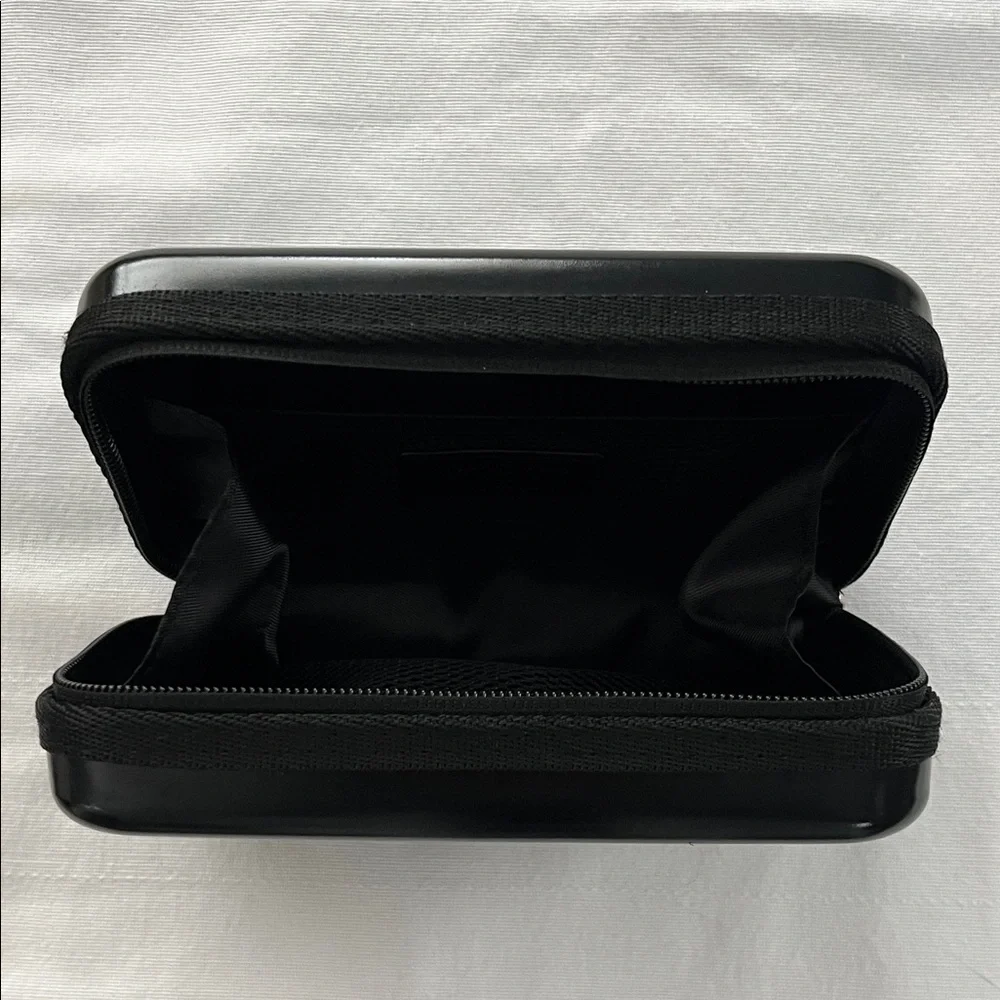 Salvatore Ferragamo Glossy Black Ridged Hard Case